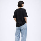 Person wearing a black t-shirt