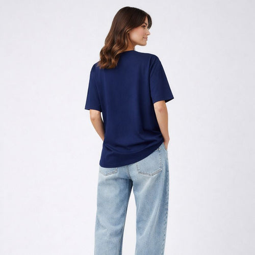 Person wearing a blue t-shirt