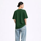 Person wearing a green t-shirt