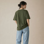 Person wearing an olive t-shirt