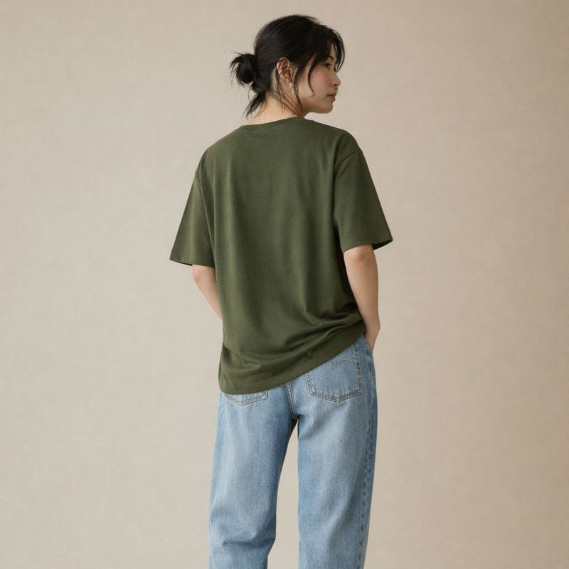 Person wearing an olive t-shirt